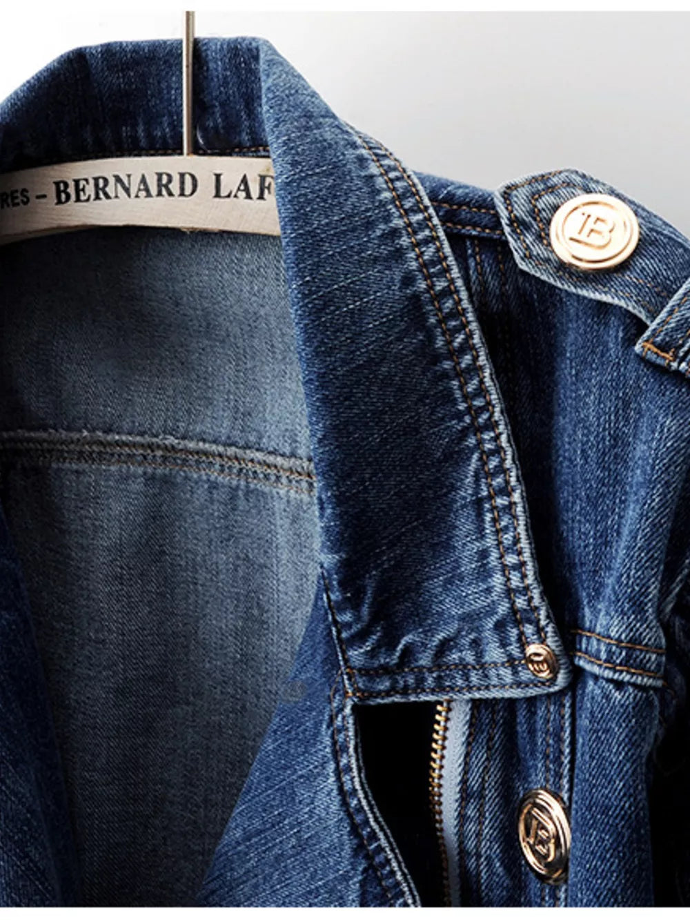 medium wash blue denim jacket with cropped and zip-front