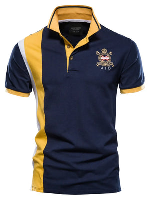 Navy polo shirt with colorblock yellow and white stripes, crest detail, and yellow collar.