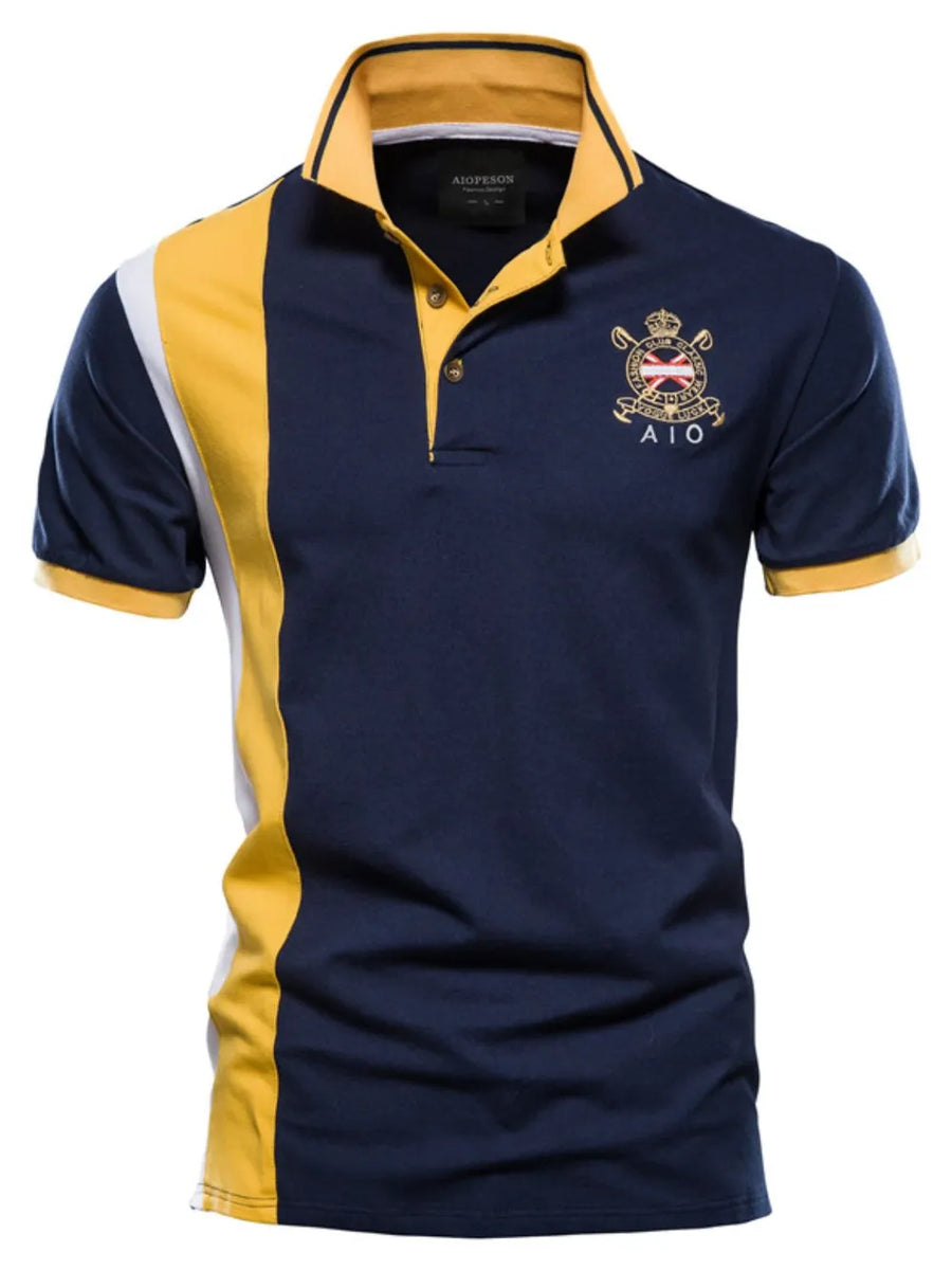 Navy polo shirt with colorblock yellow and white stripes, crest detail, and yellow collar.