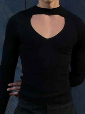 Black ribbed knit long sleeve top with heart-shaped keyhole cutout neckline.