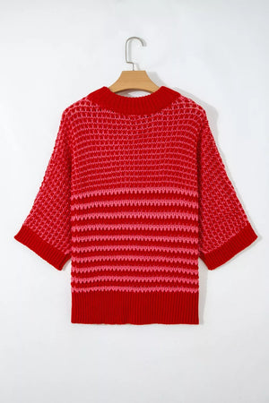 Red and pink striped knit sweater with crochet detail and crew neck.