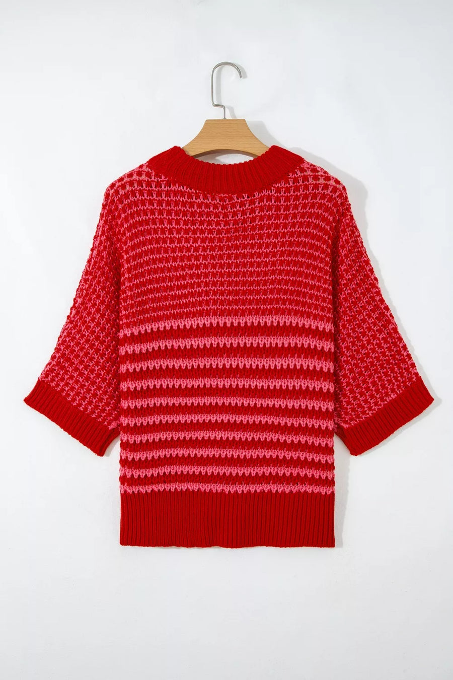 Red and pink striped knit sweater with crochet detail and crew neck.