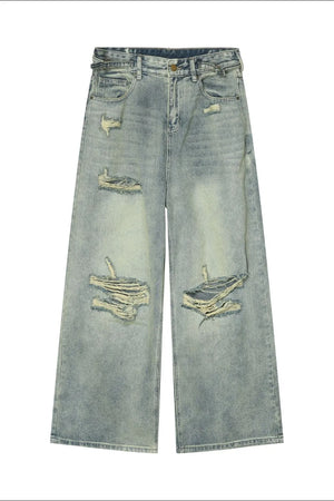 Light wash distressed denim palazzo trousers with wide legs and ripped details.