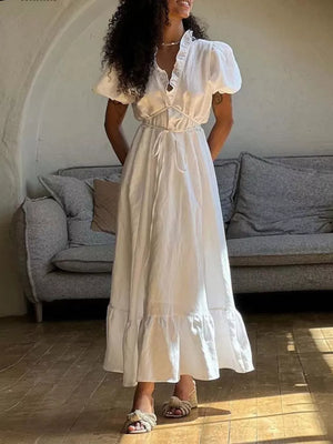 maxi dress in white featuring ruffled and A-line fit