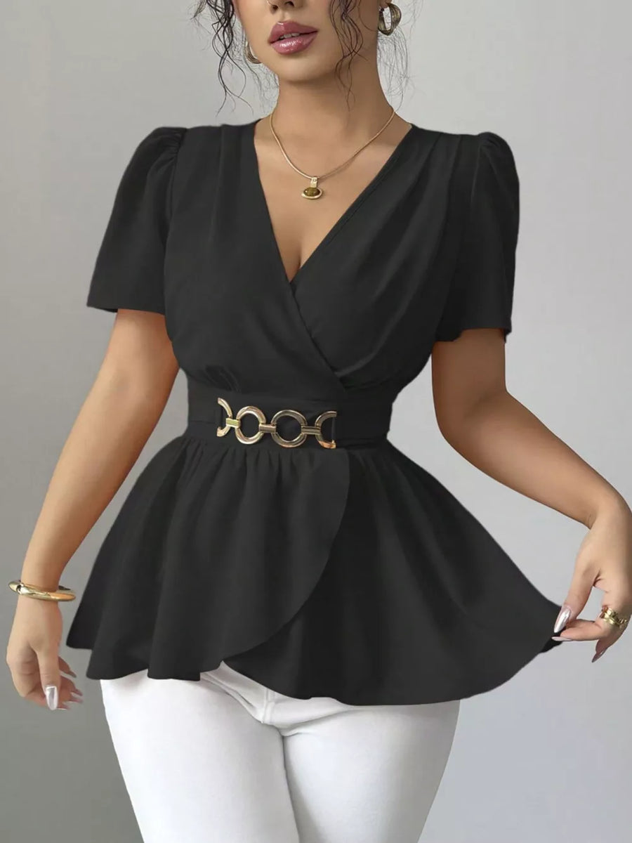 Black surplice blouse with short puff sleeves, belted waist with gold chain detail, and peplum hem.