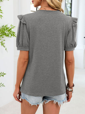 Gray short-sleeve t-shirt with ruffled shoulders and cinched cuffs.