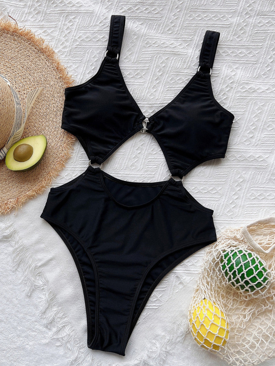Black one-piece swimsuit with ring details and cutouts