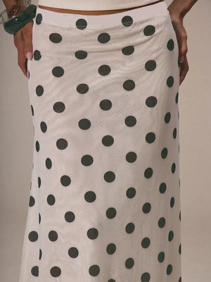 Classic polka dot midi skirt in sheer white fabric with dark grey dots.