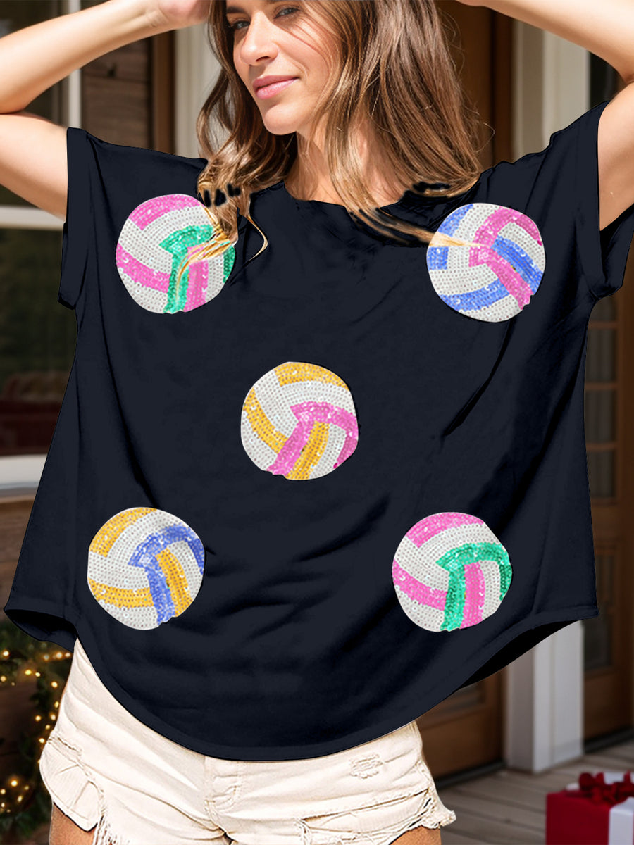 Navy t-shirt with sequin volleyball graphics in pink, blue, yellow, and green.