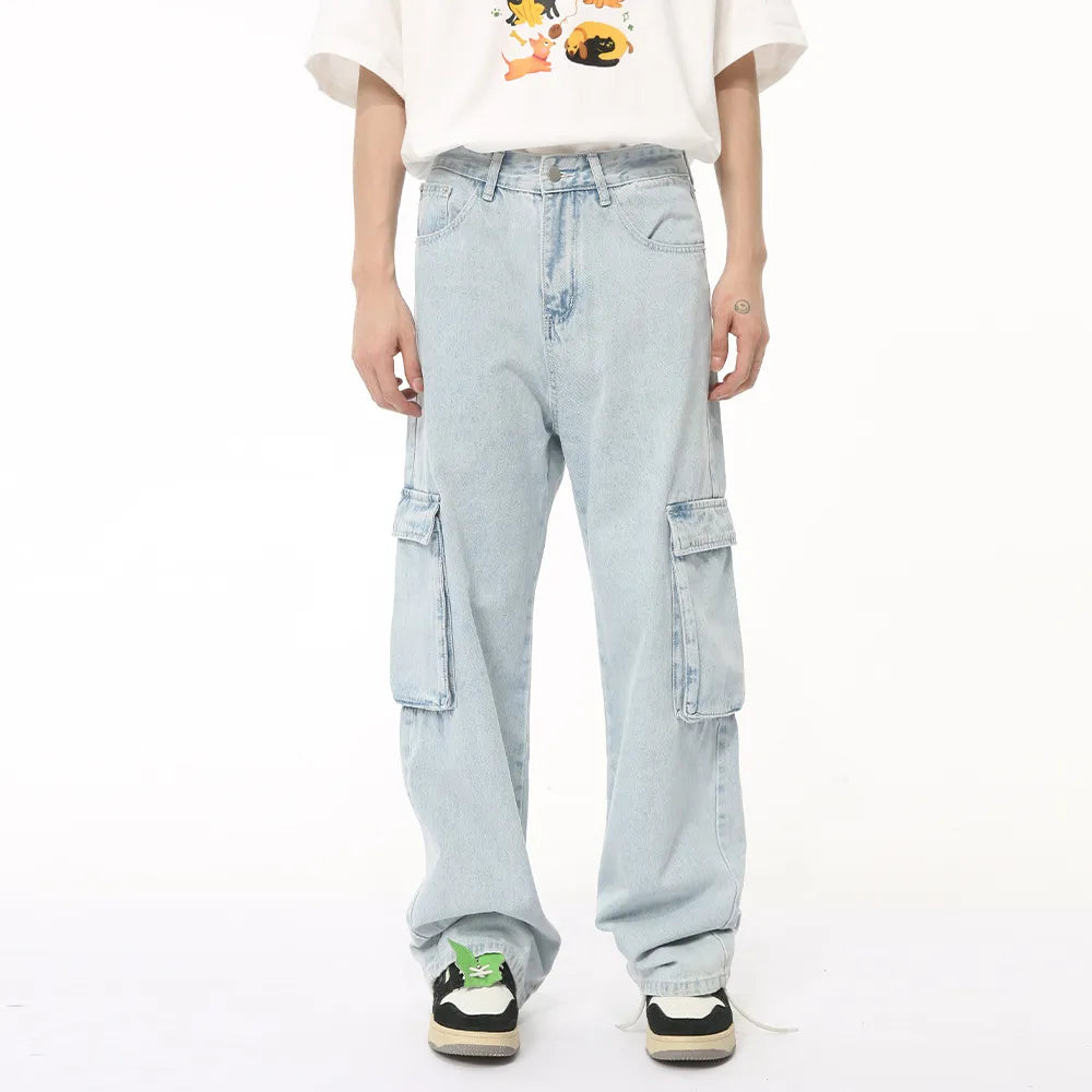 Light wash baggy denim cargo pants with multiple pockets.