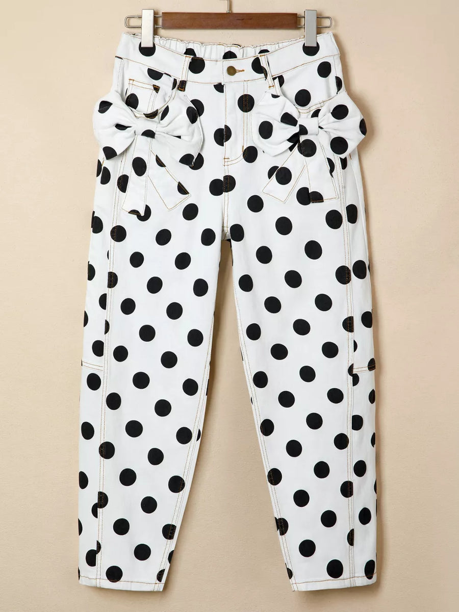 White polka dot denim jeans with bow pocket details