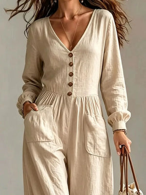 Turquoise jumpsuit with full-length and button-front, zip