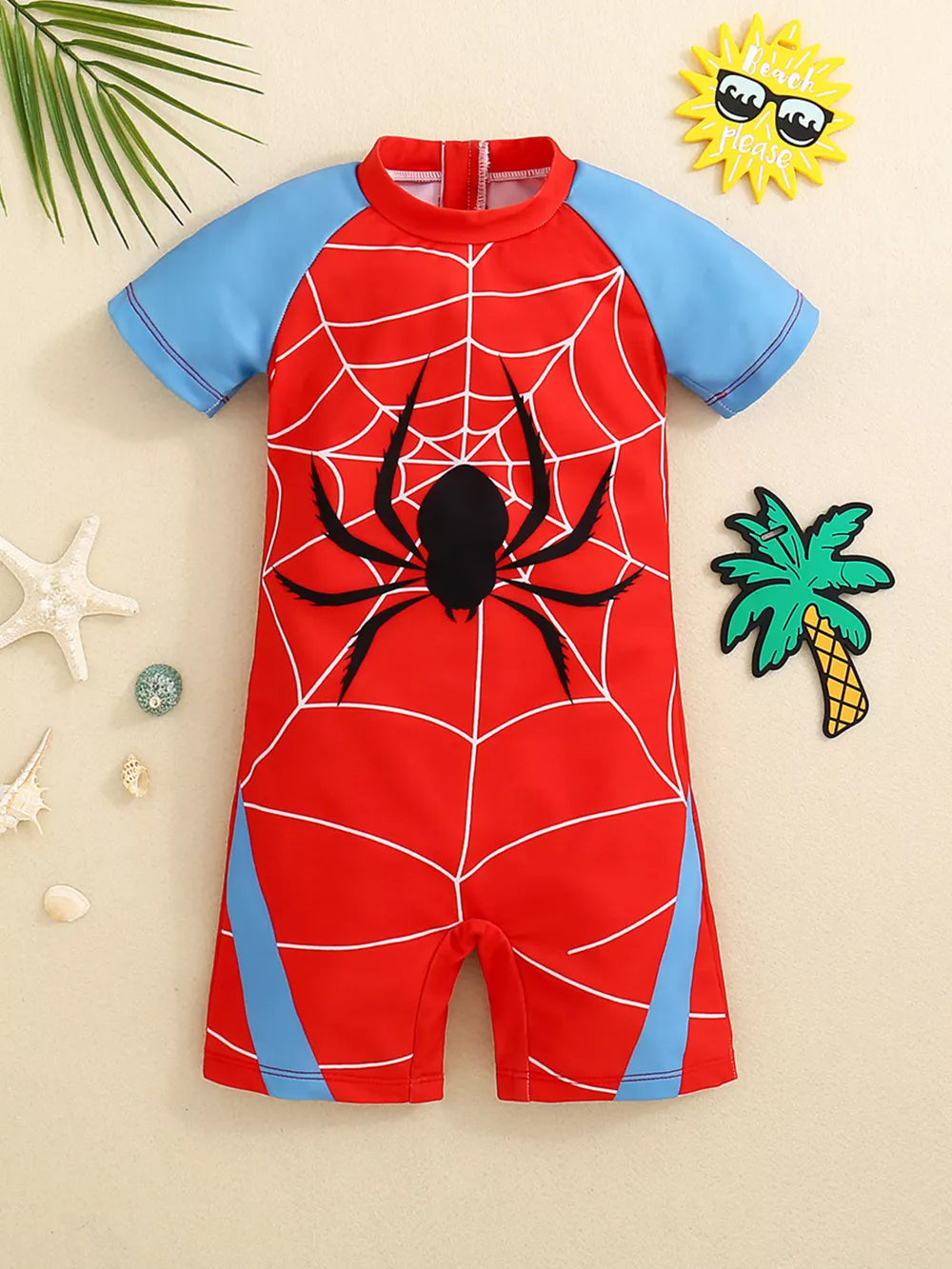 Toddler one-piece swimsuit in red with Spider-Man web and spider graphic, blue sleeves.