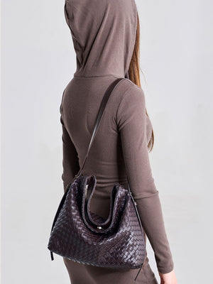 handbag in dark brown with woven and woven texture