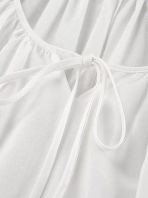 ivory relaxed mini dress with tie neck