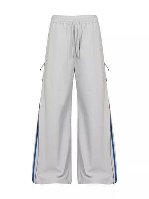 wide-leg pants in light gray featuring drawstring waist and wide-leg fit