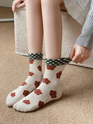 rust socks featuring elastic cuff and floral