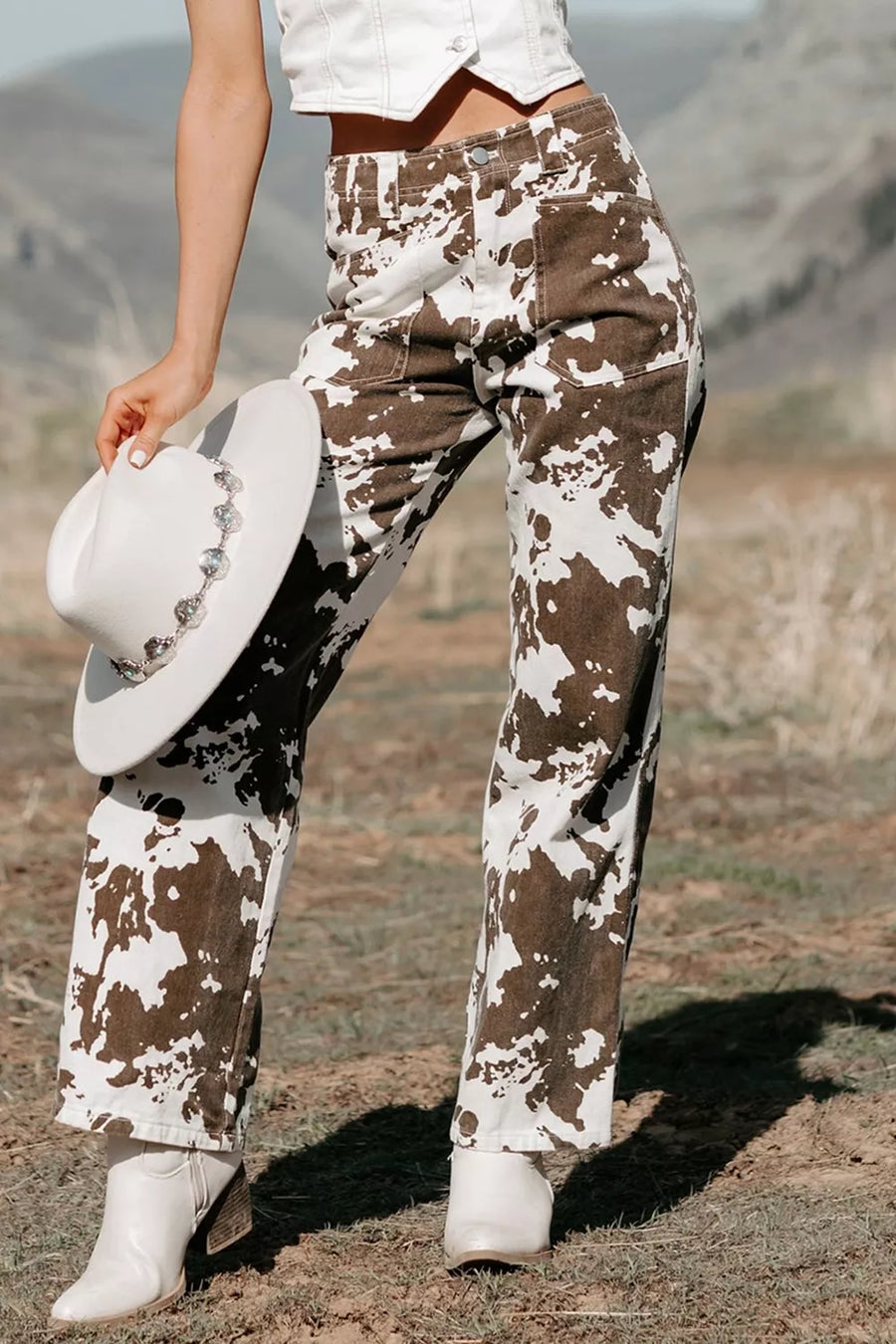 jeans featuring abstract in white with 98% cotton, 2% elastane Care instructions: Machine wash cold texture