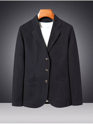 Black cotton lapel blazer for men with buttoned front and patch pockets.