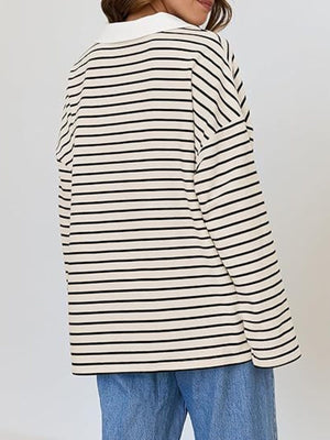 Oversized striped long-sleeve sweatshirt in cream and black with a white collar.