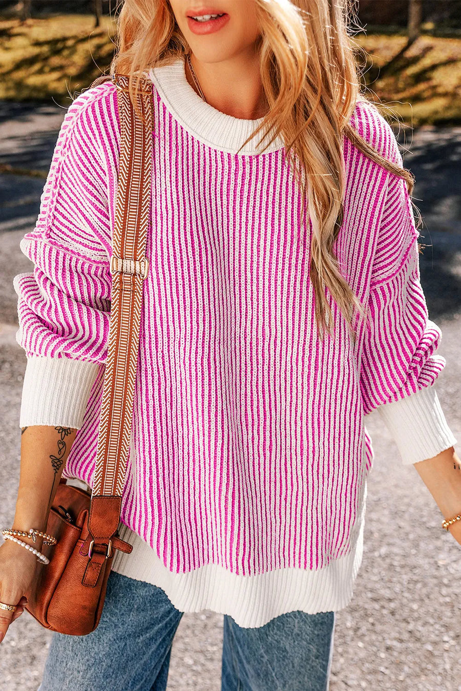 Hot Pink vertical stripe drop-shoulder knit sweater with white trim and crew neck.