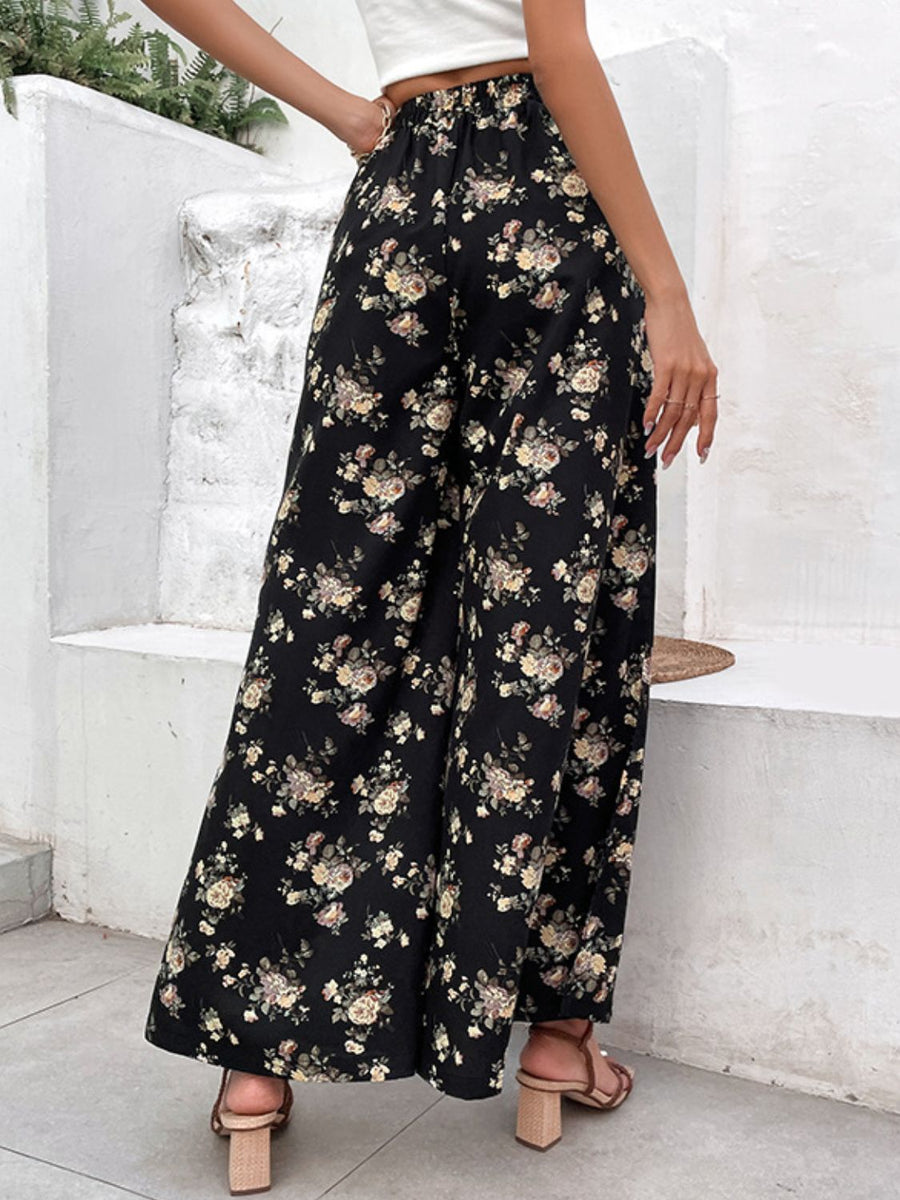 Black floral palazzo trousers with split hem detail