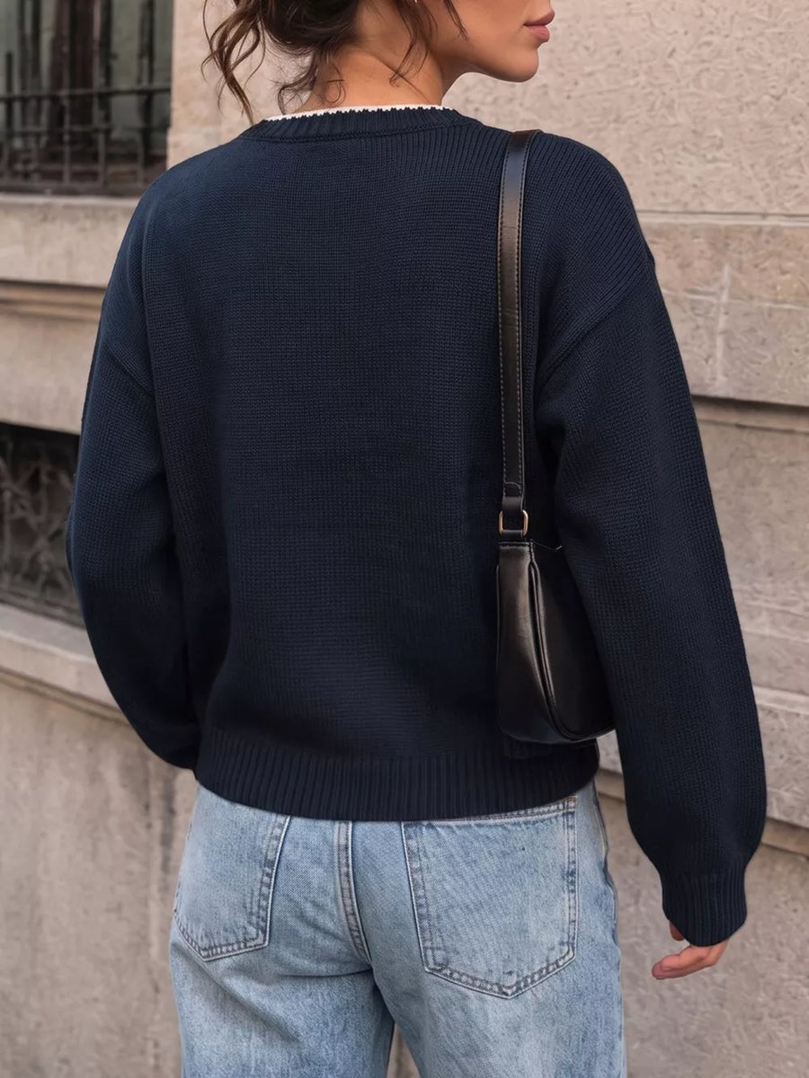 classic pullover sweater in white with crew neck