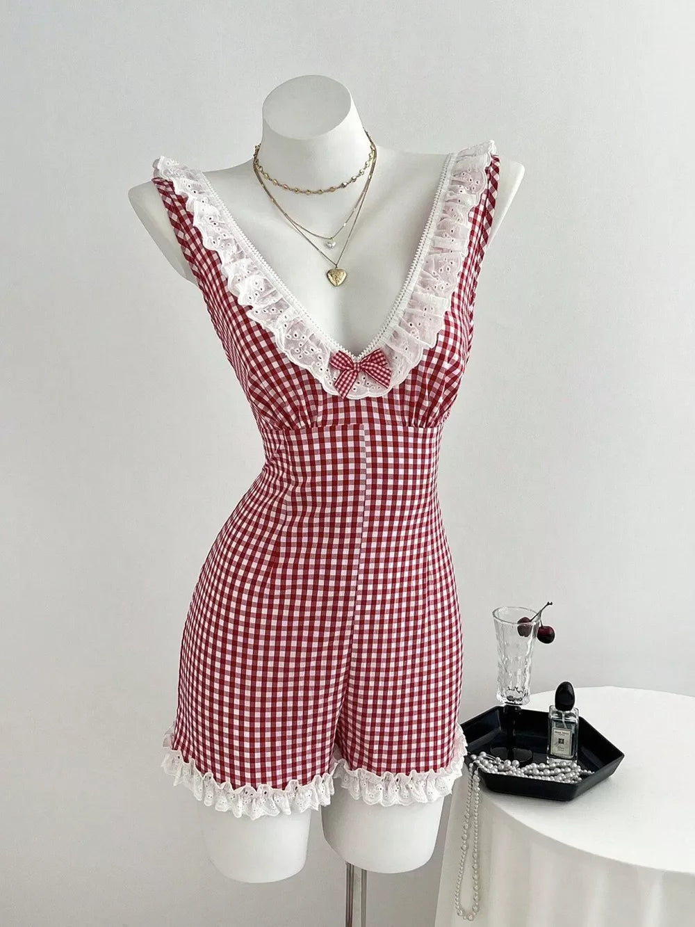 cherry red romper with gingham and v-neck