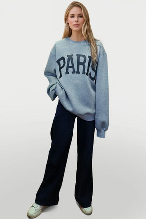 Gray crewneck sweatshirt with black Paris graphic, crew neck, long sleeves.