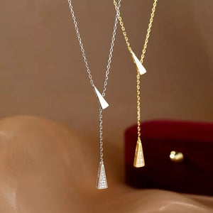 Sterling silver Y necklace with triangle pendant and delicate chain.