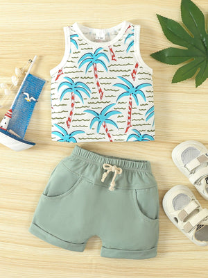 Baby tank top and shorts set in light green with tropical palm print on top.