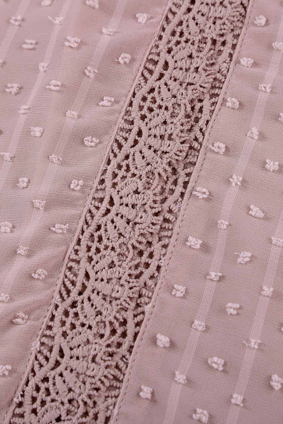 Dotted Swiss lace trim blouse in dusty pink with textured dots and vertical stripes.