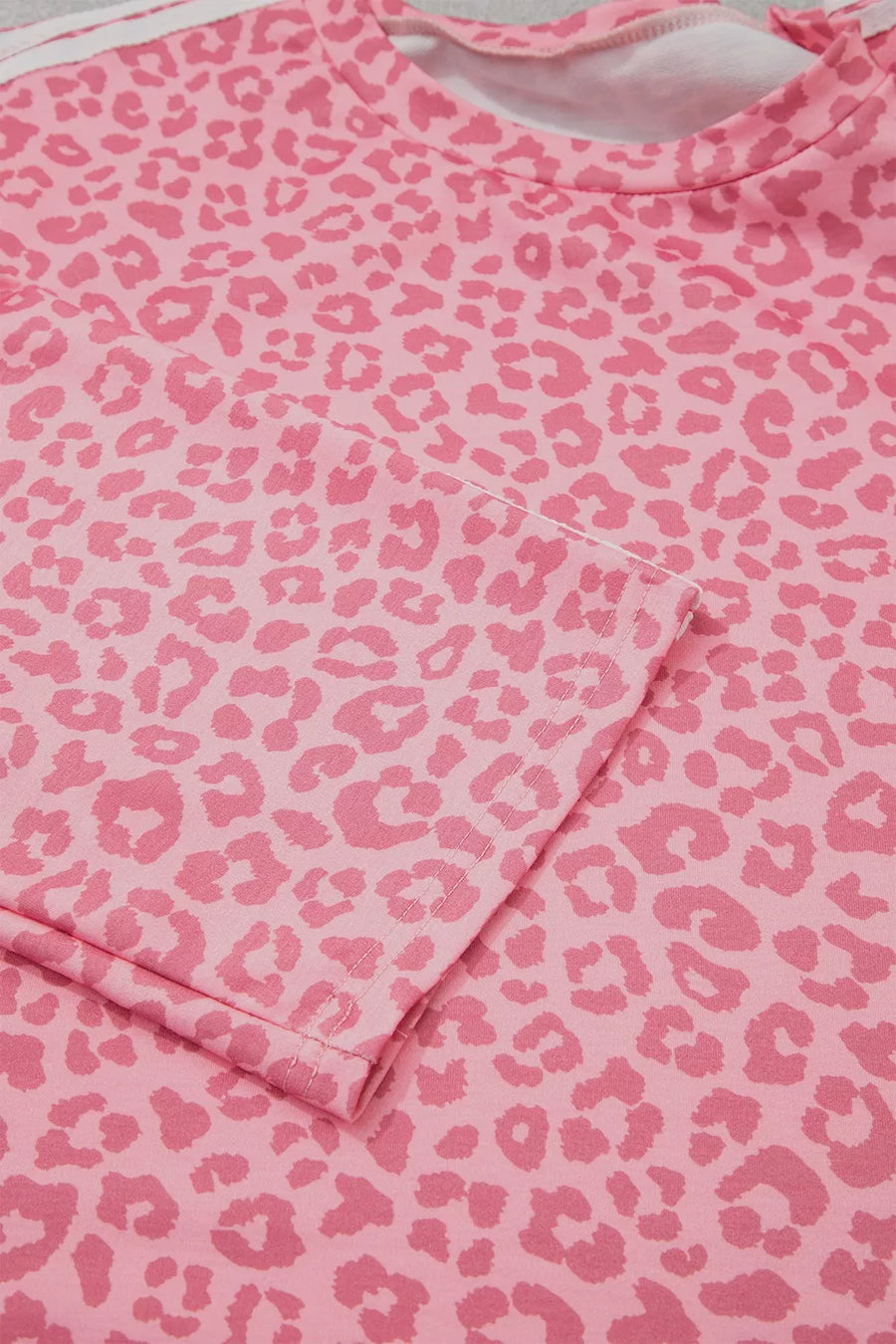 two-piece set featuring leopard-print, striped in Dusty Pink with 100% polyester Care instructions: Machine wash cold texture