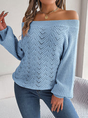 Misty Blue open-knit off-shoulder sweater with voluminous sleeves and a chevron pattern.