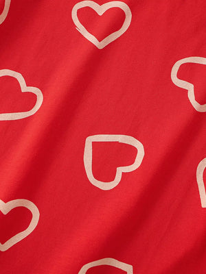 Red cotton t-shirt for kids with a scattered heart print.