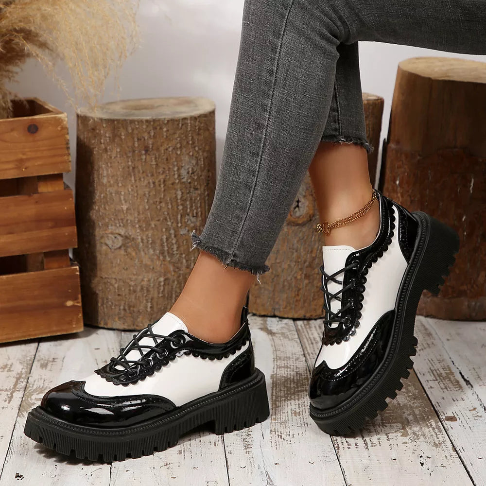 white sneakers featuring round toe and color-block