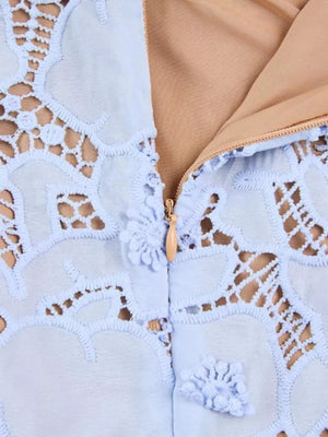 Sky blue floral lace midi dress with zipper detail and applique flowers.