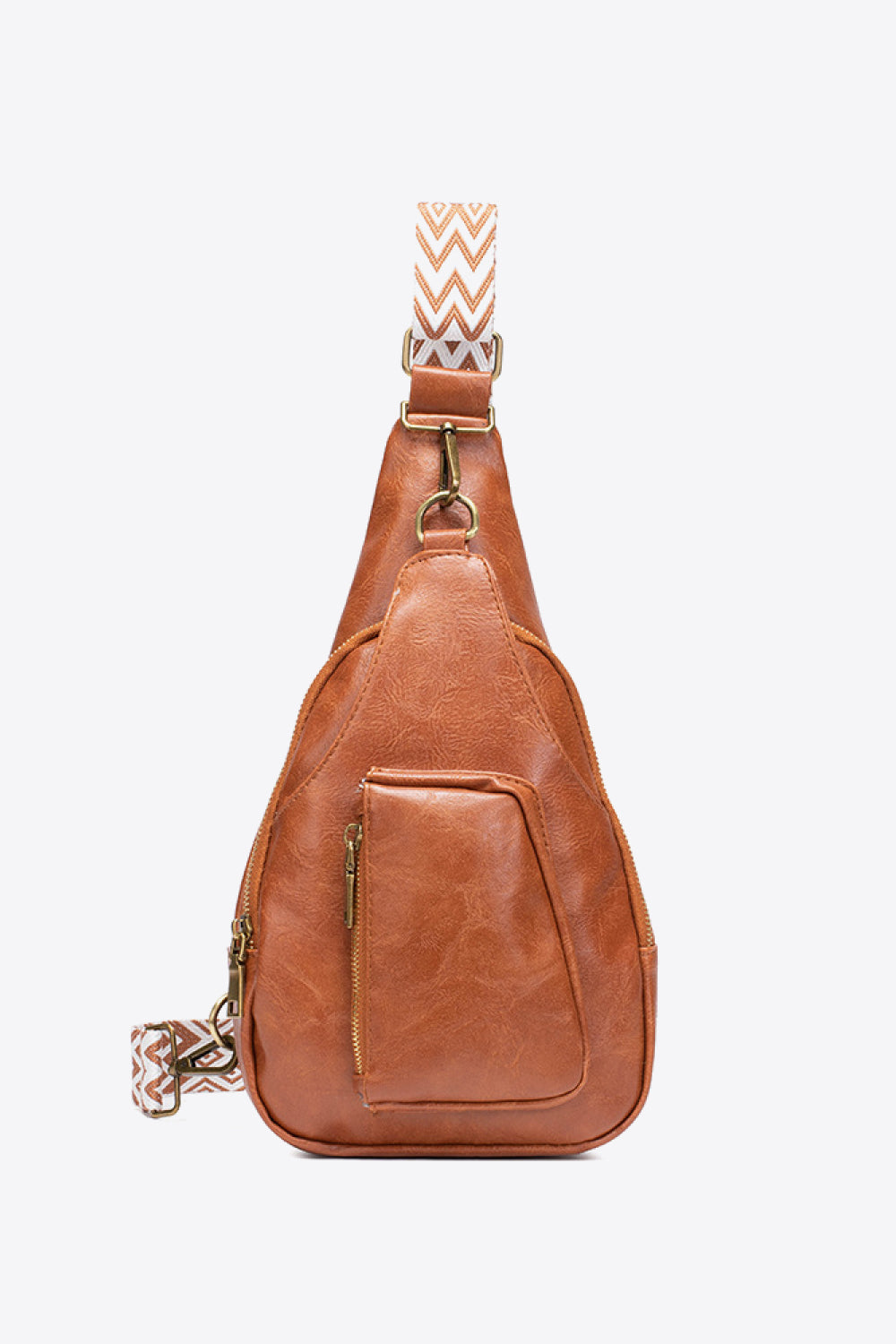 Brown textured sling bag with woven strap detail and front zip pocket