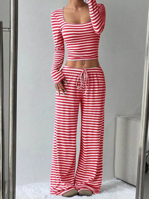 Red and white striped crop top and wide-leg pants with drawstring waist.
