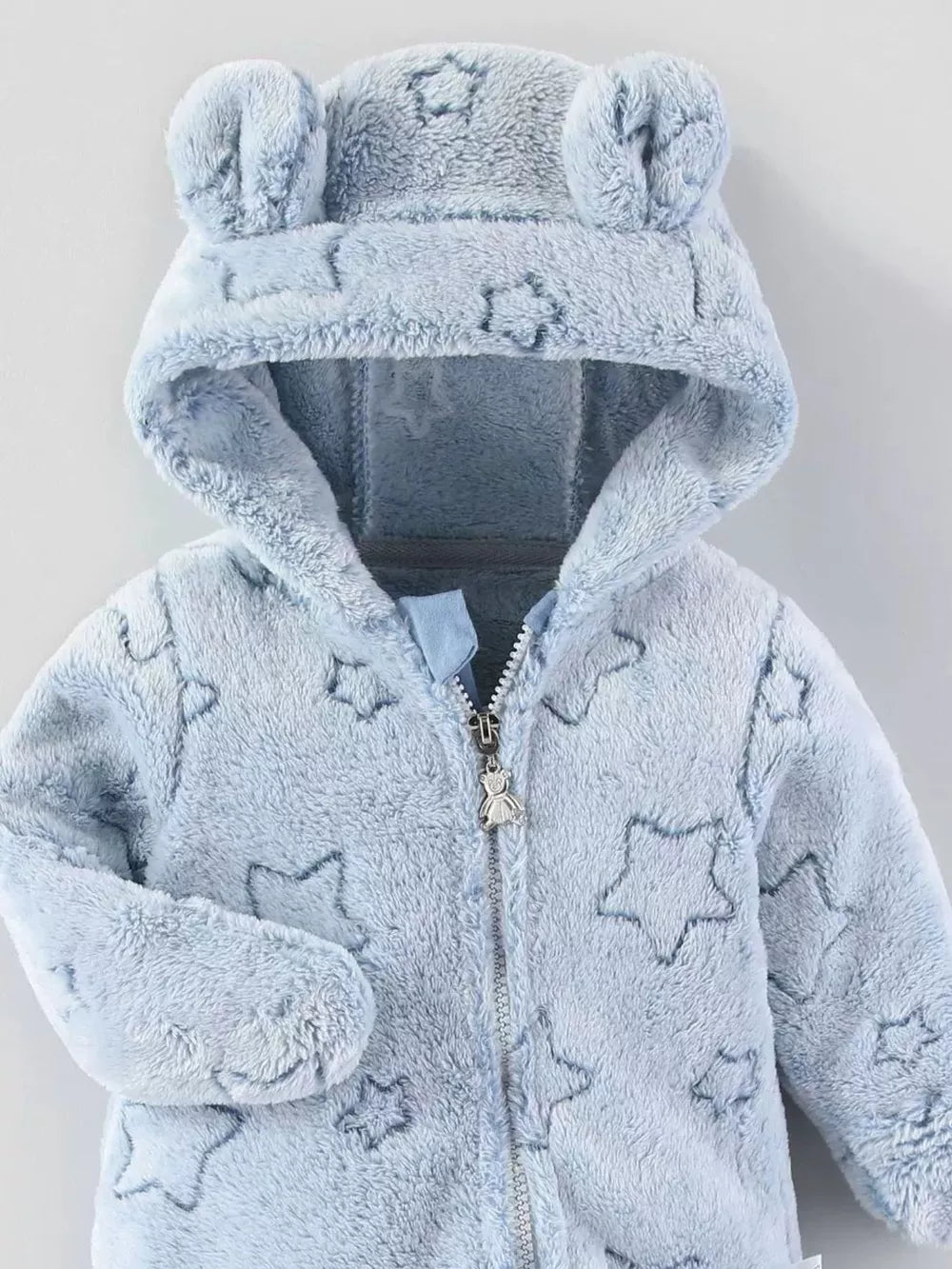 Light blue plush one-piece pajama with bear ears hood and star pattern