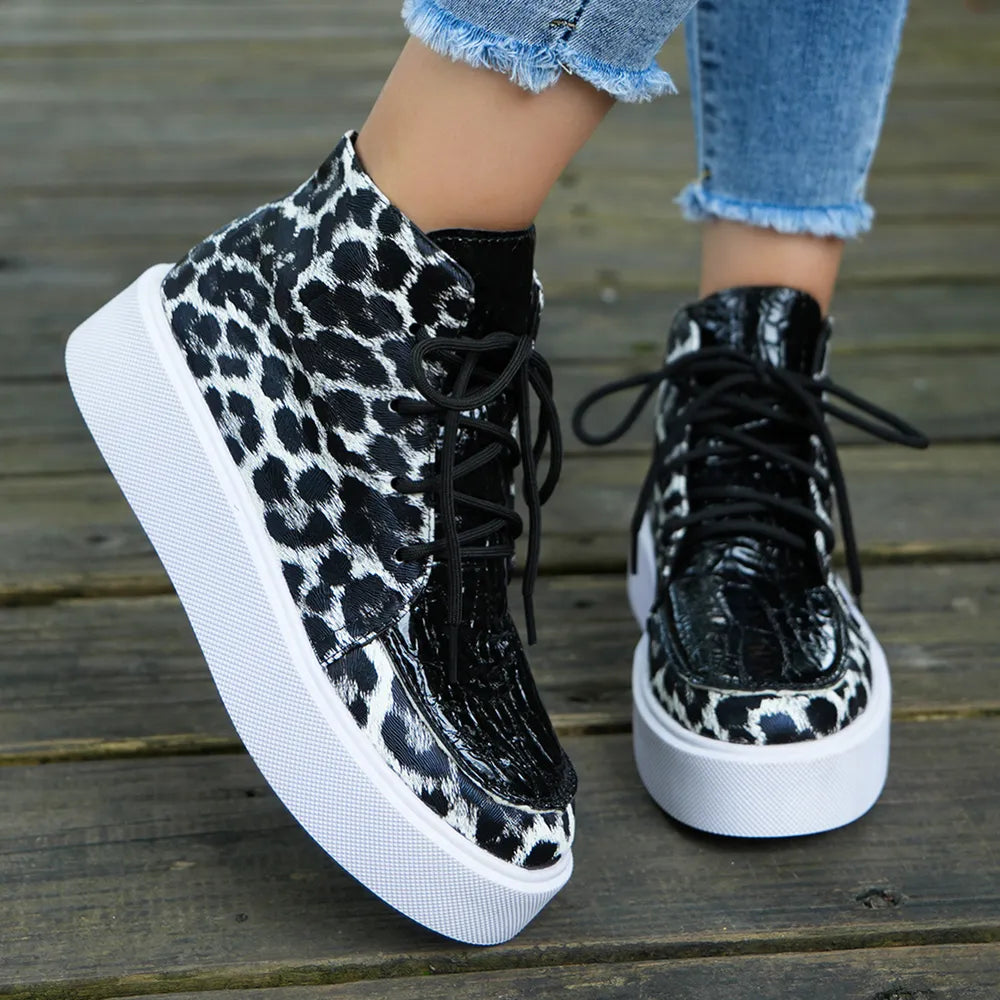 Patent leopard platform high-tops with black accents and white soles.