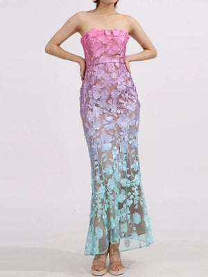 Strapless floral lace maxi dress in pink, purple, and blue ombre.