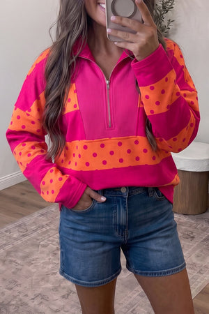 hot pink sweatshirt with polka dot and mock neck