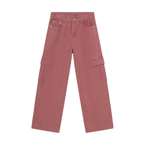 Oversized cargo denim trousers in dusty pink with large side pockets and a relaxed fit.