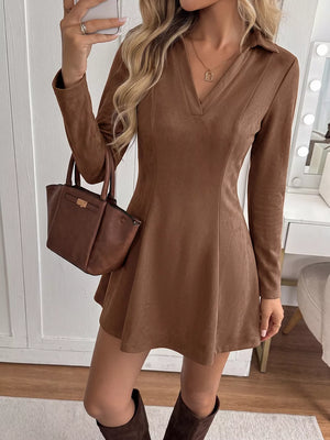 Brown suede mini dress with long sleeves, V-neck, and collar.