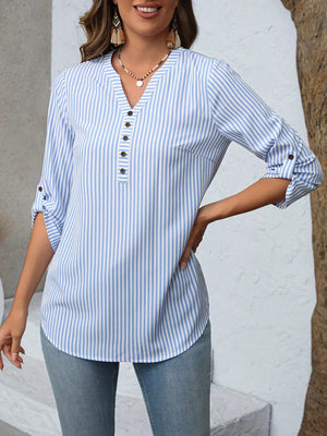 Light Blue Strip vertical stripe V-neck blouse with roll-up sleeves and button detail.