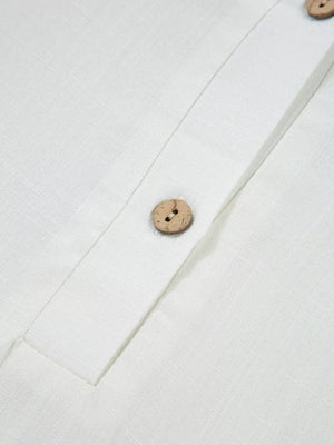 White linen shirt with wooden buttons and a button-up placket.