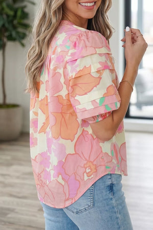 Cotton short sleeve shirt with retro floral pattern, band collar, and layered sleeves.