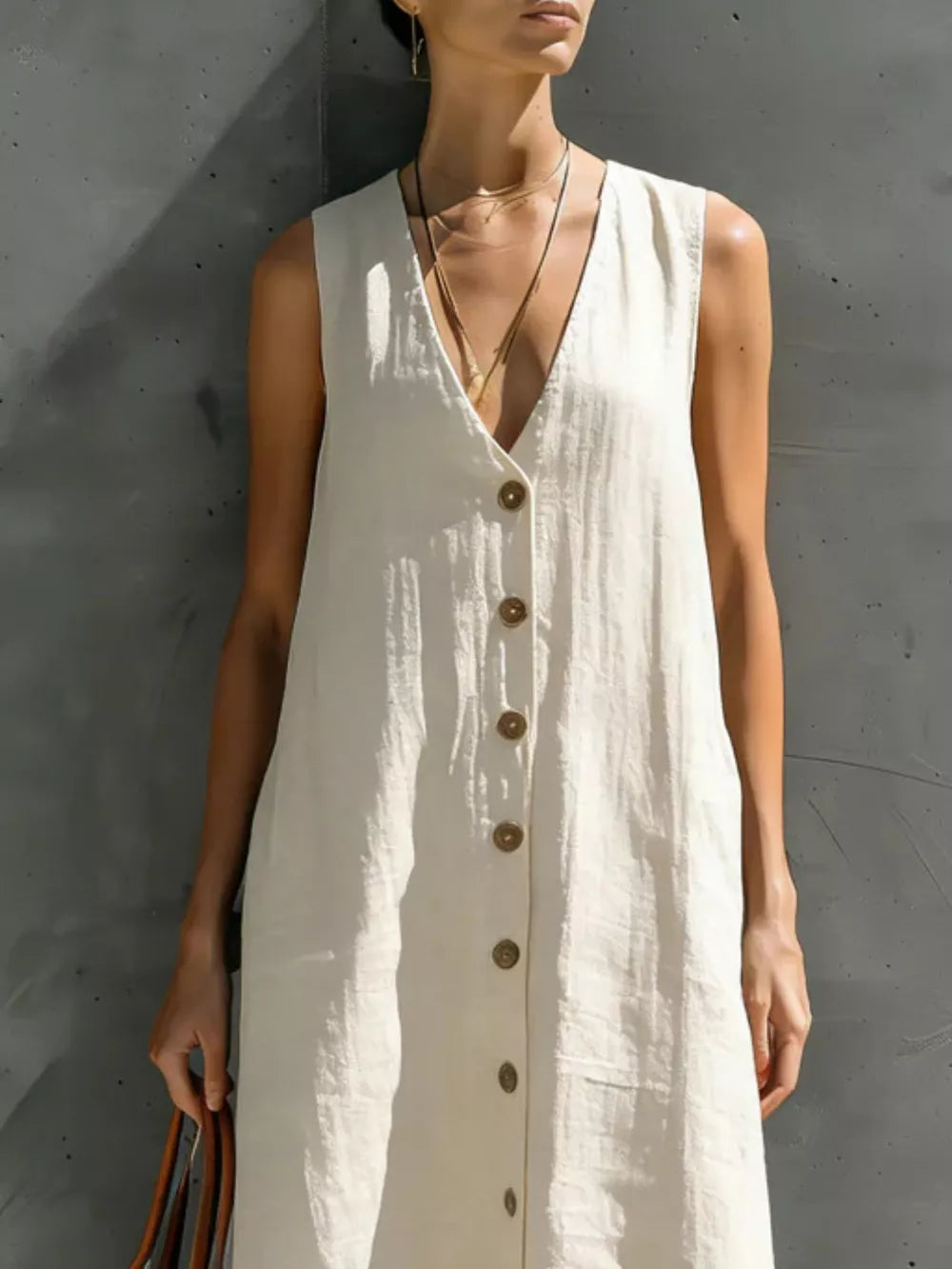 100% polyester Care instructions: Machine wash cold maxi dress in Ivory White with straight silhouette