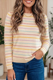 Beige crewneck sweater featuring stretch and striped